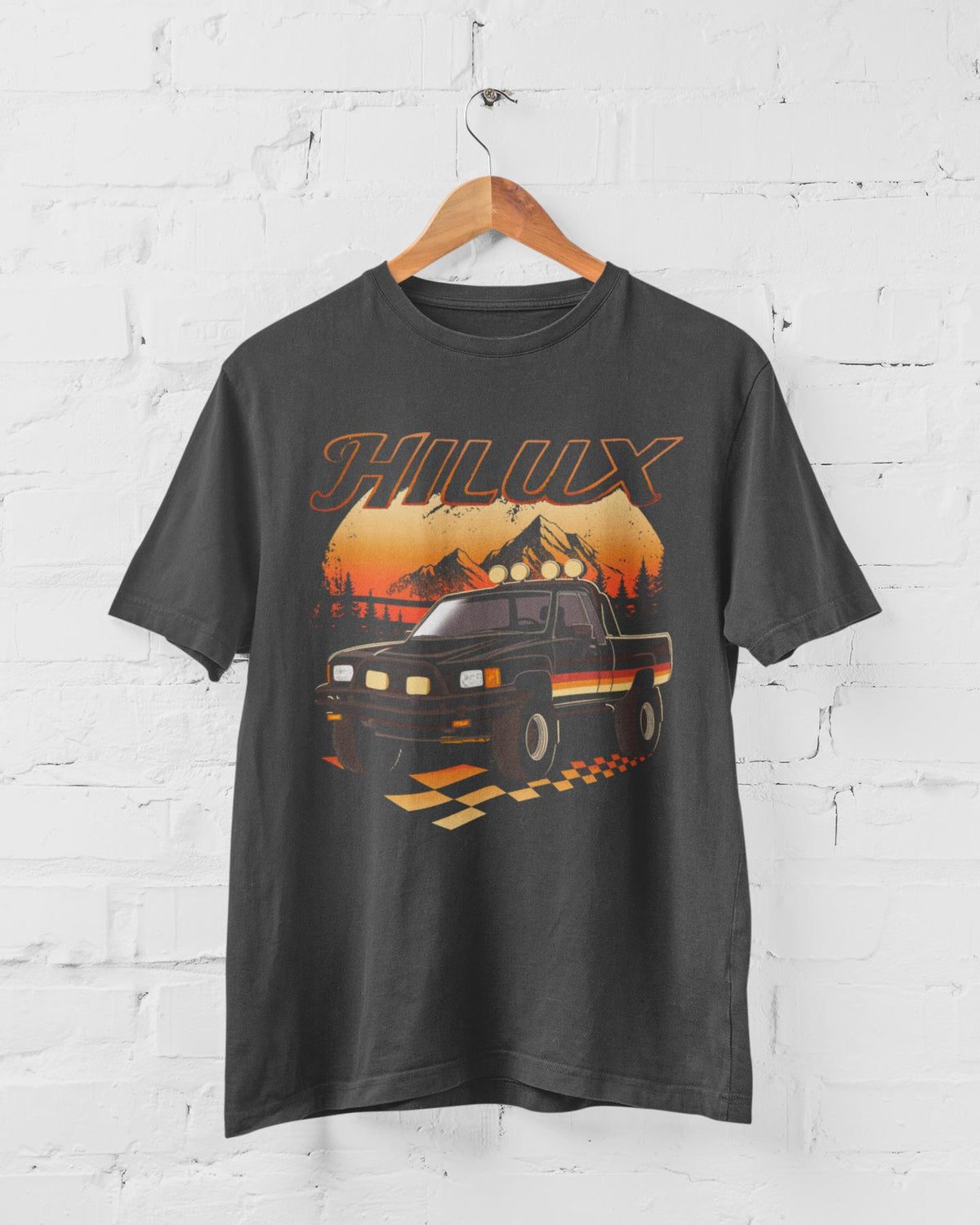 1980s Toyota Hilux T-Shirt: Classic Pickup Truck, Race Flag Design